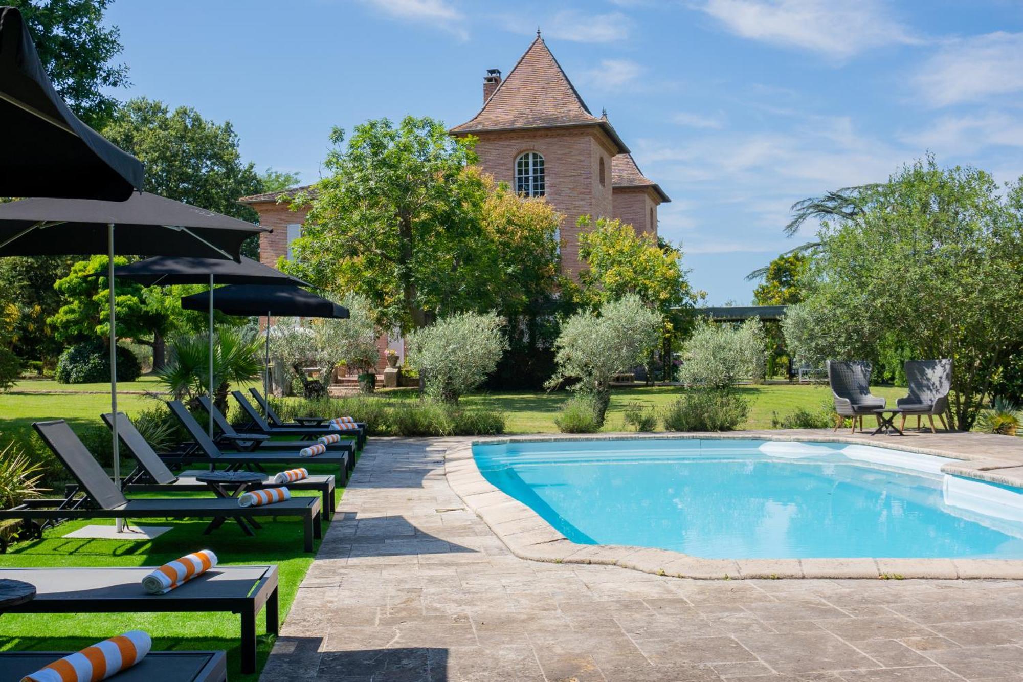 Castel Bois Marie, Maison D'Hotes 蒙托邦 外观 照片 The swimming pool at Château de Chaumont